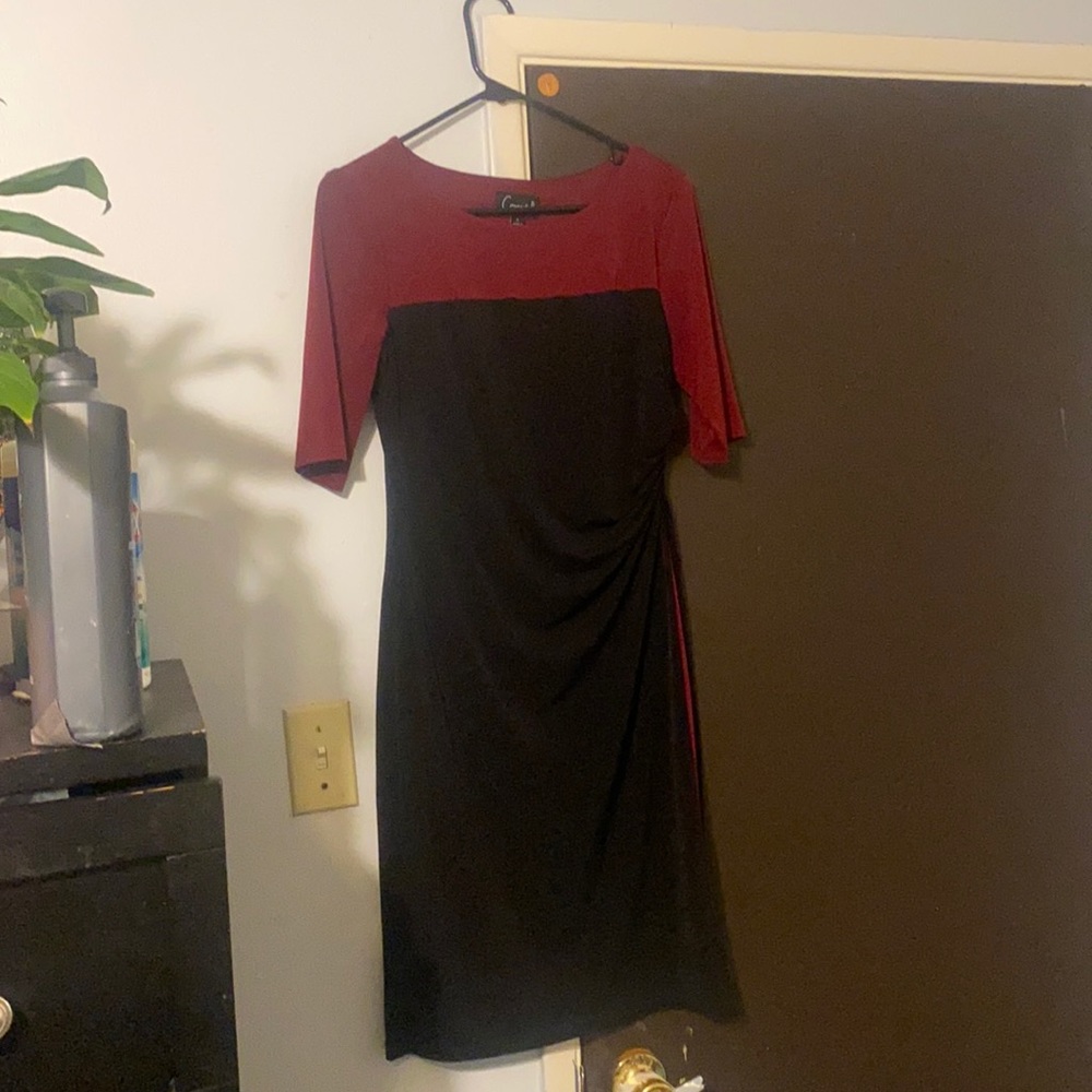 Black dress with Maroon touch.